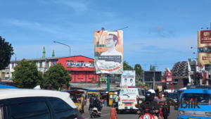 Masa Tenang Pilkada, Spanduk Cabup Masih Mejeng Cantik Di Jalur Puncak